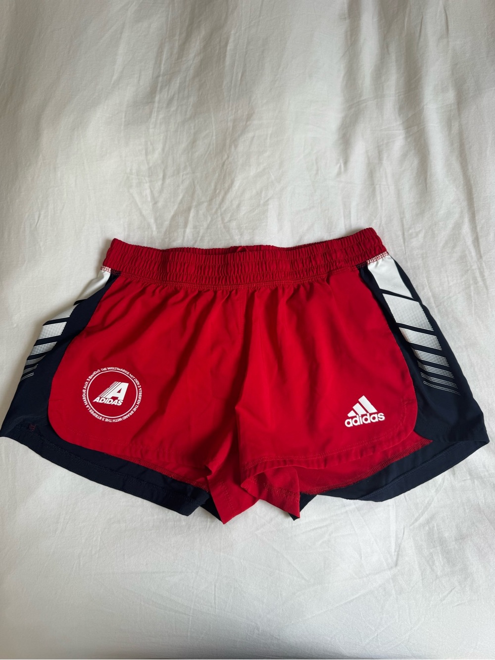 women’s Adidas running shorts (size L)